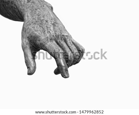 Statue hand with extended pointer finger , fragment of old sculpture on abstract white background. symbol of attention, warning.  white-black color. copy space. element for design