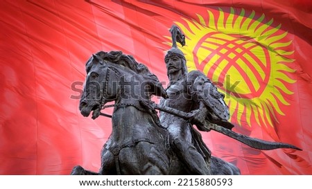 Statue of the hero Manas representing the epic of Manas and the flag of Kyrgyzstan on Alatau Square in Bishkek KYRGYZSTAN