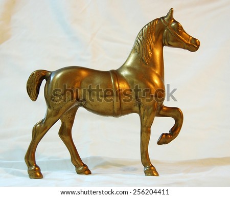 The statue of a horse made of brass