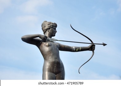 Statue Of Huntress Diana With Blue Sky