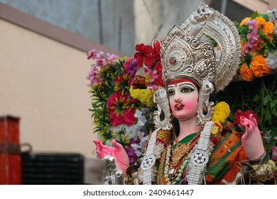 Statue idol of Goddess durga festival of Navratri. Faith, spiritual, pilgrimage, people, decoration, colours, people,  eyes, artist, sculpture, paint, crown, jewellery, saint, mata, colors, garba.