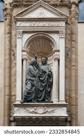 Statue of the Incredulity of St. Thomas in the Exterior Tabernacle in the Exterior Perimeter of the Church of Orsanmichele in Florence, Italy.