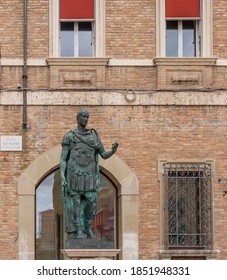 The statue of Julius Caesar in the Piazza Tre Martiri square in the historic center of Rimini, Emilia Romagna, Italy