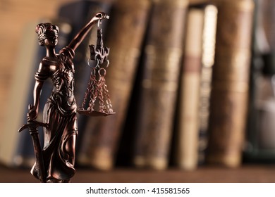 Statue of justice, burden of proof, law theme - Shutterstock ID 415581565