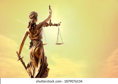 Statue of justice. Close-up Of Justice Lady Against Abstract nature background, blurred Sunset sky at twilight time. - Shutterstock ID 1879076134