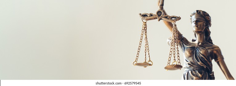 The Statue of Justice - lady justice or Iustitia / Justitia the Roman goddess of Justice - Shutterstock ID 692579545