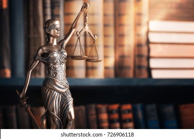 Statue Of Justice On Library Background.