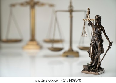 Statue of justice on white background. - Shutterstock ID 1471439540