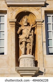 Statue Of King John III At The Palace Gate Or Iron Gate In The University Of Coimbra, Portugal