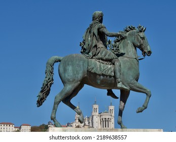 
Statue Of King Louis The 14th And In The Background The Fourvière Hill On Which The Notre Dame De Fourvière Basilica Is Placed In Lyon France