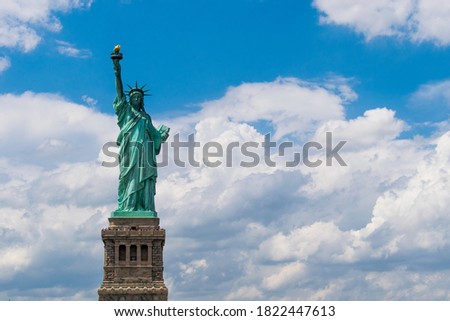 Statue of Liberty with clouds
