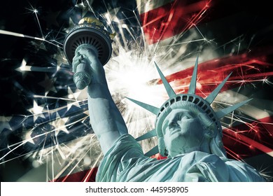 Statue Of Liberty With Fireworks And Flag Of USA