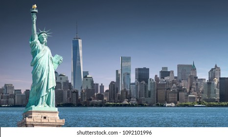 The Statue of Liberty with high-rise building in Lower Manhattan background, Landmarks of New York City, USA - Shutterstock ID 1092101996