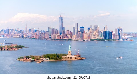Statue of Liberty and Lower Manhattan skyline, aerial view.