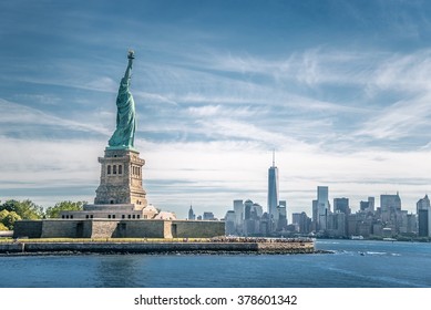 The statue of Liberty and Manhattan, New York City - Shutterstock ID 378601342