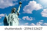 Statue of liberty. Monument in USA. Statue of liberty in New York. Monument from USA under blue sky. Symbol of democracy of united states. Top of statue of liberty close-up. Sights of New York
