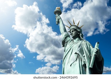 Statue of liberty. Monument in USA. Statue of liberty in New York. Monument from USA under blue sky. Symbol of democracy of united states. Top of statue of liberty close-up. Sights of New York