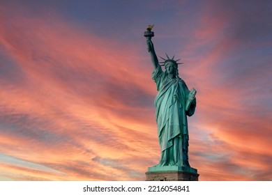 Statue Of Liberty , New York , Usa. Cloudy Winter Day. Sunset Time