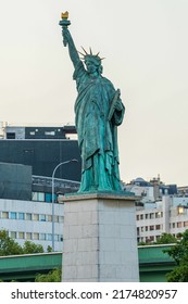 Statue of Liberty on the Ile aux Cygnes, River Seine in Paris. The grandest replica of all is just off the Grenelle Bridge on the little man-made island called Ile aux Cygnes.