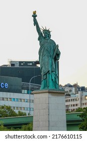 Statue of Liberty on the Ile aux Cygnes, River Seine in Paris. The grandest replica of all is just off the Grenelle Bridge on the little man-made island called Ile aux Cygnes
