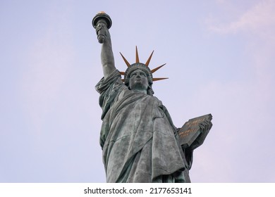 Statue of Liberty on the Ile aux Cygnes, River Seine in Paris. The grandest replica of all is just off the Grenelle Bridge on the little man-made island called Ile aux Cygnes