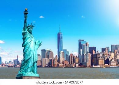 The Statue of Liberty with the One world Trade building center over hudson river and New York cityscape background, Landmarks of lower manhattan New York city. Architecture and building concept - Shutterstock ID 1470372077