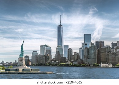 The Statue of Liberty with One World Trade Center background, Landmarks of New York City, USA