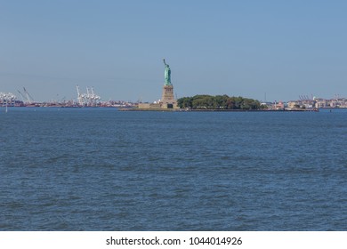Statue of Liberty and panoramic view of Manhattan City skyline from the Staten Island public ferry. New York. USA.