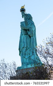 Statue Of Liberty Profile Low Angle View Against Blue Sky, New York City, USA