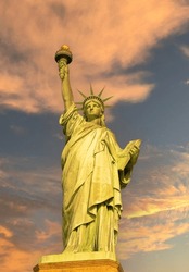 Statue Of Liberty At Sunrise In Golden Tones Front View