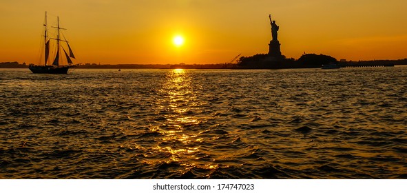 Statue Of Liberty At Sunset