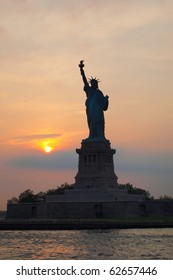 Statue Of Liberty At Sunset