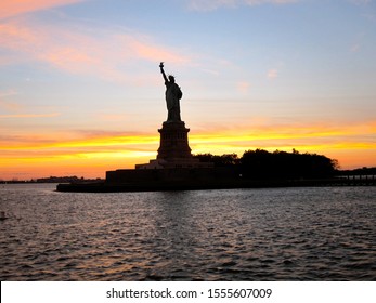 Statue Liberty with sunset sky, NY, USA - Powered by Shutterstock