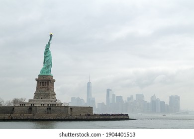 the statue of liberty from the water