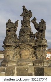 Statue Of The Madonna, St. Dominic And Thomas Aquinas On Charles Bridge In Prague