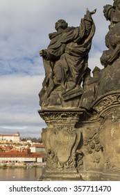 Statue Of The Madonna, St. Dominic And Thomas Aquinas On Charles Bridge In Prague