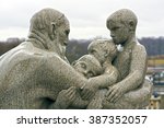 Statue of man and children by Gustav Vigeland in Frogner Park. Oslo, Norway. May 04, 2013