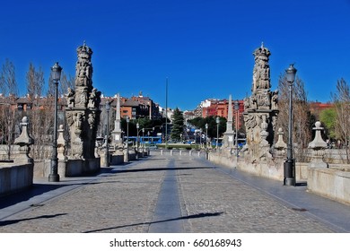 Statue Of Maria Torribia (right) And Statue Of Isidore The Laborer (left) On Bridge Of Toledo (Puente De Toledo), A Baroque Style Bridge Spans The Manzanares River, Madrid, Spain