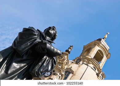 Statue of Martin Luther in Front of the famous reconstructed Church Frauenkirche in Dresden. Church Of Our Lady
