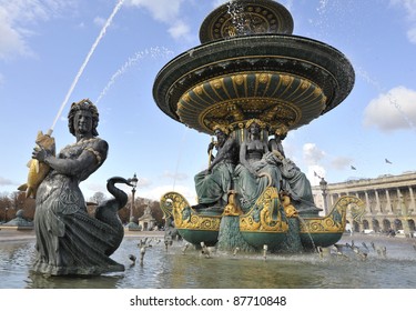 Statue Of A Merman In A Parisian Fountain