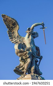 Statue of Michael the Archangel with sword (designed in 1753) on top of the Castel Sant Angelo in Rome Italy