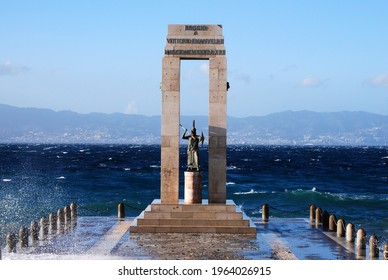 Statue In The Middle Of A Storm. Reggio Calabria, Winter 2010.