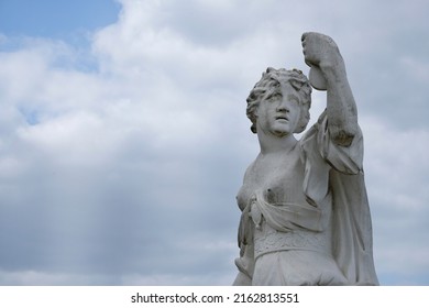 Statue with a mirror or seemingly taking a selfie - Shutterstock ID 2162813551