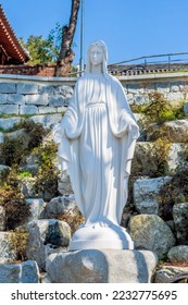 Statue Mother Mary in rock garden at Nabawi Catholic Church in Iksan  South Korea 