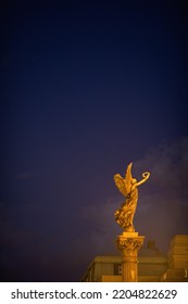 Statue Near Rudolfinum Concert Hall At Night In Prague, Czech Republic.