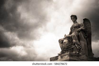 The Statue Of Nike, The Goddess Of Victory (in Greek Mythology) With Sky Background In Monotone