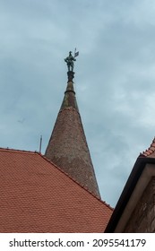 A Statue On Top Of The Corvins' Castle Spire