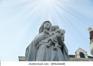 Statue Of Our Lady Virgin Mary With Child Jesus In Catholic Church, Thailand. Selective Focus.