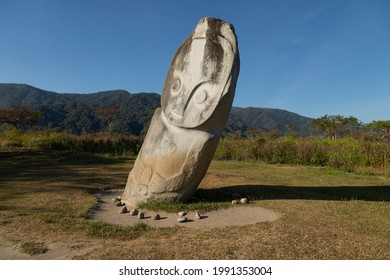 Statue of the Palindo megalith, from unknown prehistoric megalithic cultures, is located in the Bada Valley, Central Sulawesi, Indonesia - Shutterstock ID 1991353004