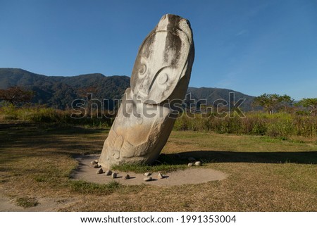 Statue of the Palindo megalith, from unknown prehistoric megalithic cultures, is located in the Bada Valley, Central Sulawesi, Indonesia